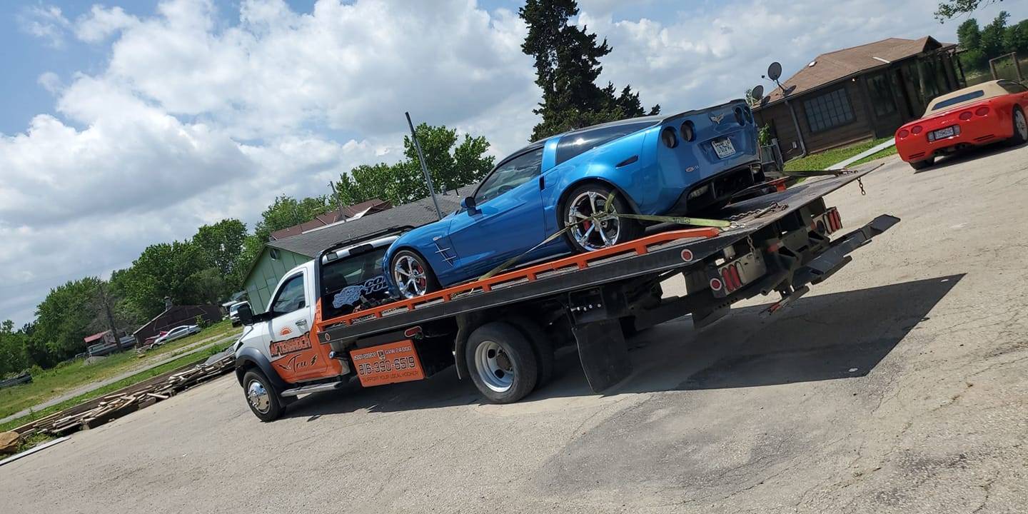 Aftershock Tow truck recovering a vehicle in St Joseph MO